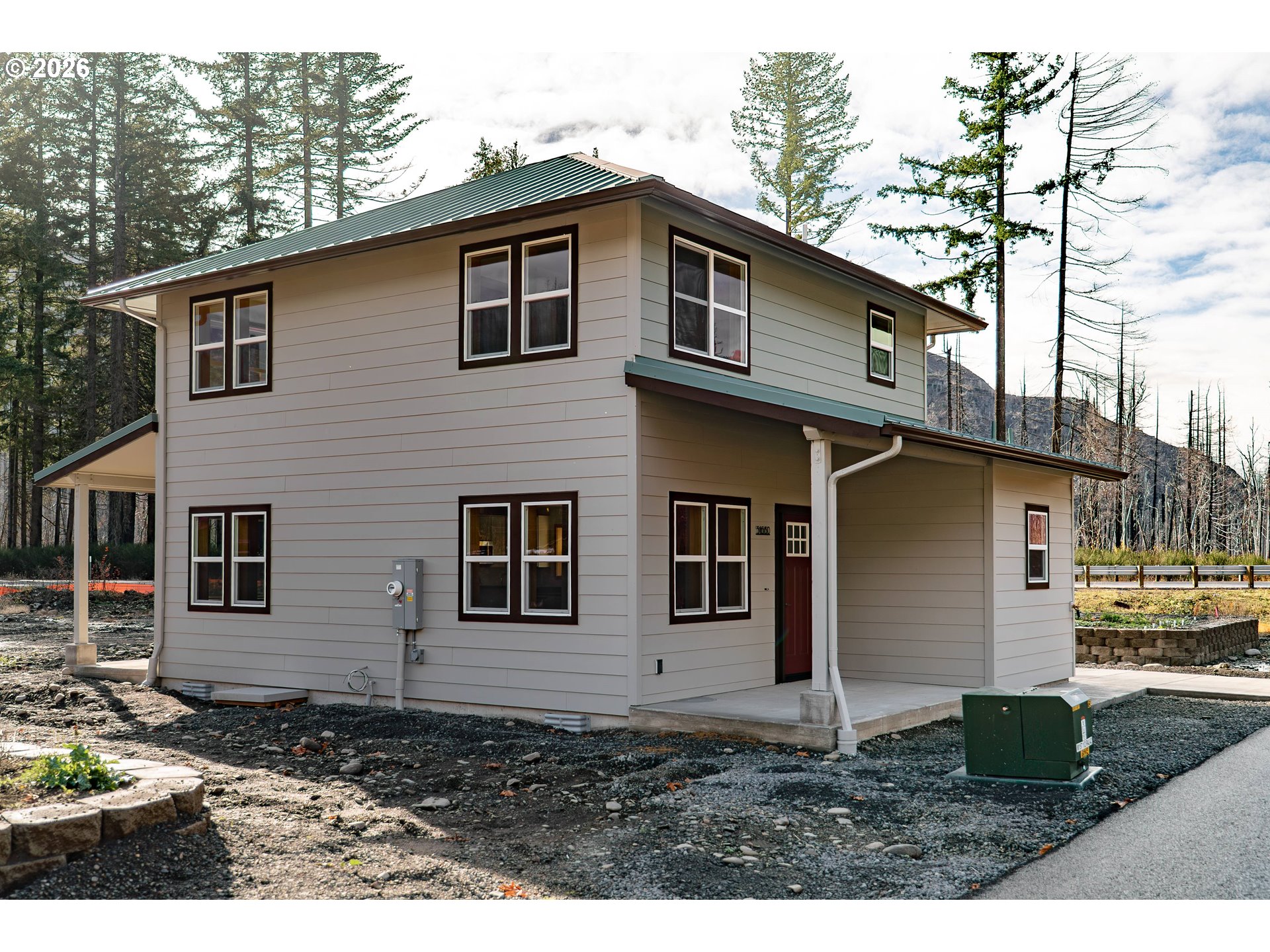 51680 Rose Street Blue River, OR 97413 - Photo 1 of 17 a view of a house with a yard