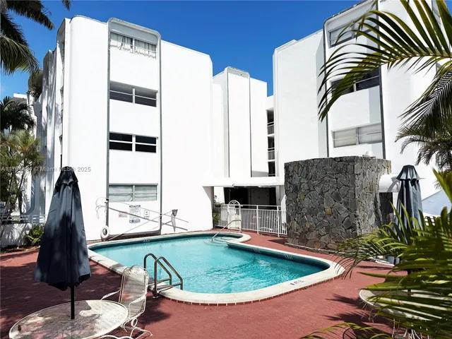 a view of balcony with patio