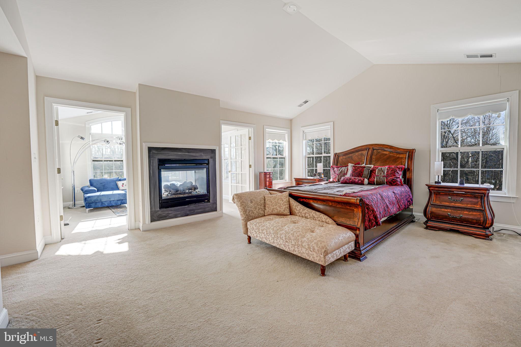 13024 Queen Chapel Road Woodbridge, VA 22193 - Photo 27 of 73 primary bedroom / gas fireplace / sitting room