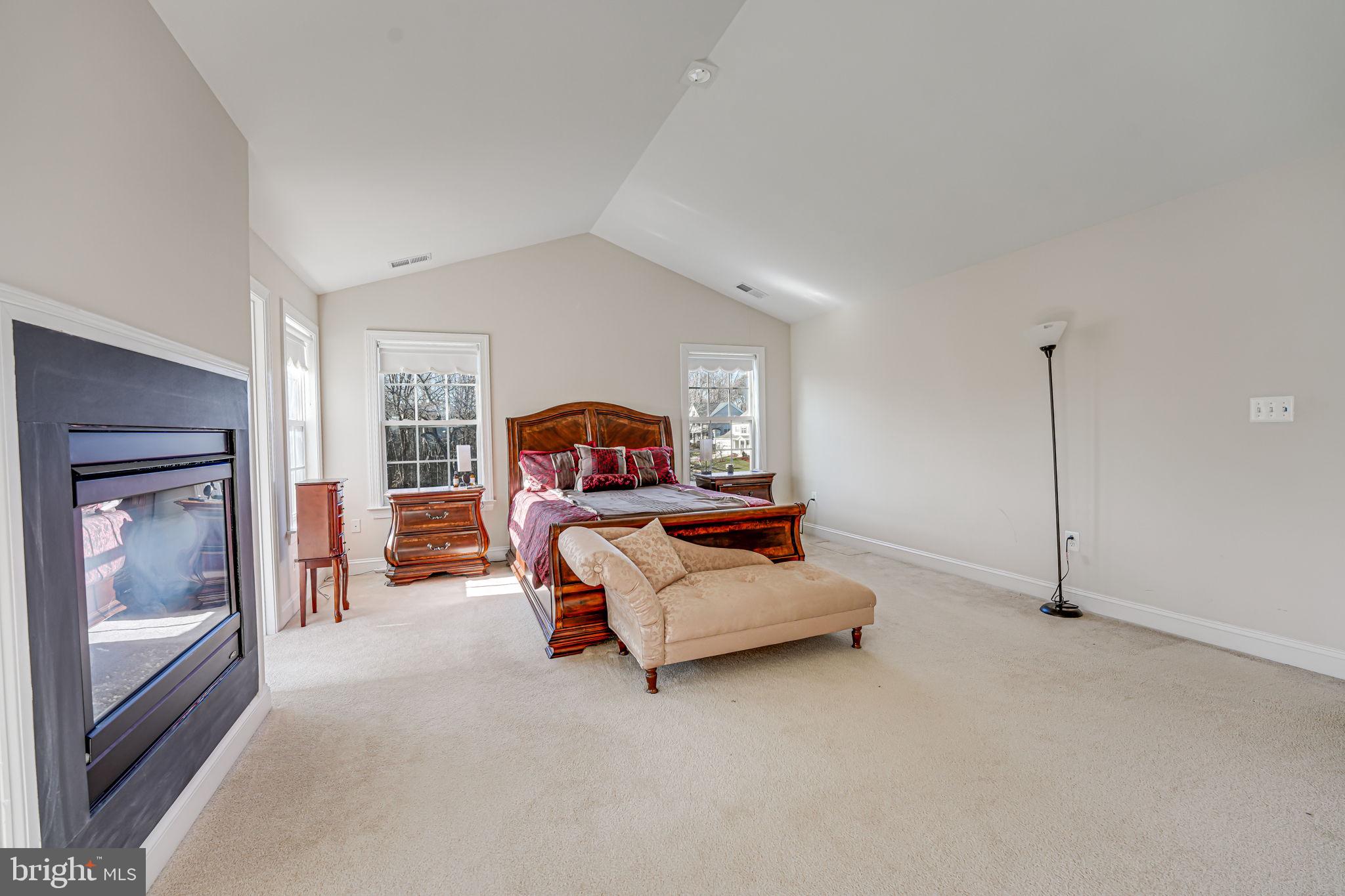 13024 Queen Chapel Road Woodbridge, VA 22193 - Photo 29 of 73 primary bedroom / gas fireplace / sitting room