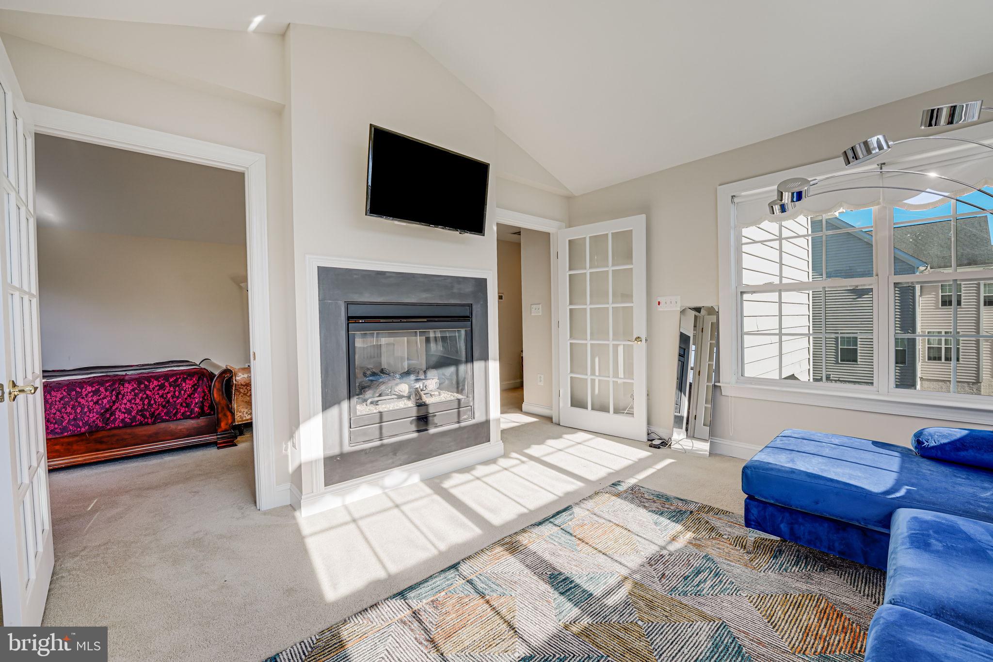 13024 Queen Chapel Road Woodbridge, VA 22193 - Photo 30 of 73 primary bedroom / gas fireplace / sitting room