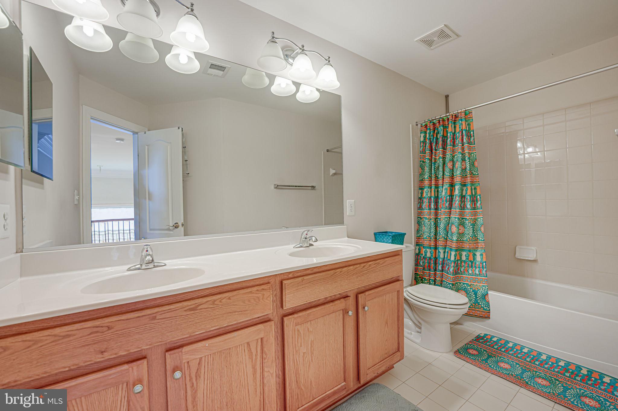 13024 Queen Chapel Road Woodbridge, VA 22193 - Photo 45 of 73 shared bathroom dual vanity
