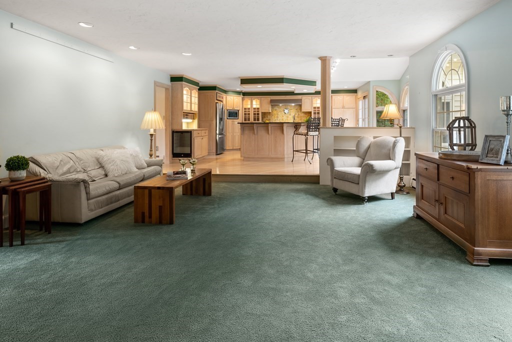 4 Standish Drive Canton, MA 02021 - Photo 11 of 32 a living room with furniture and a large window