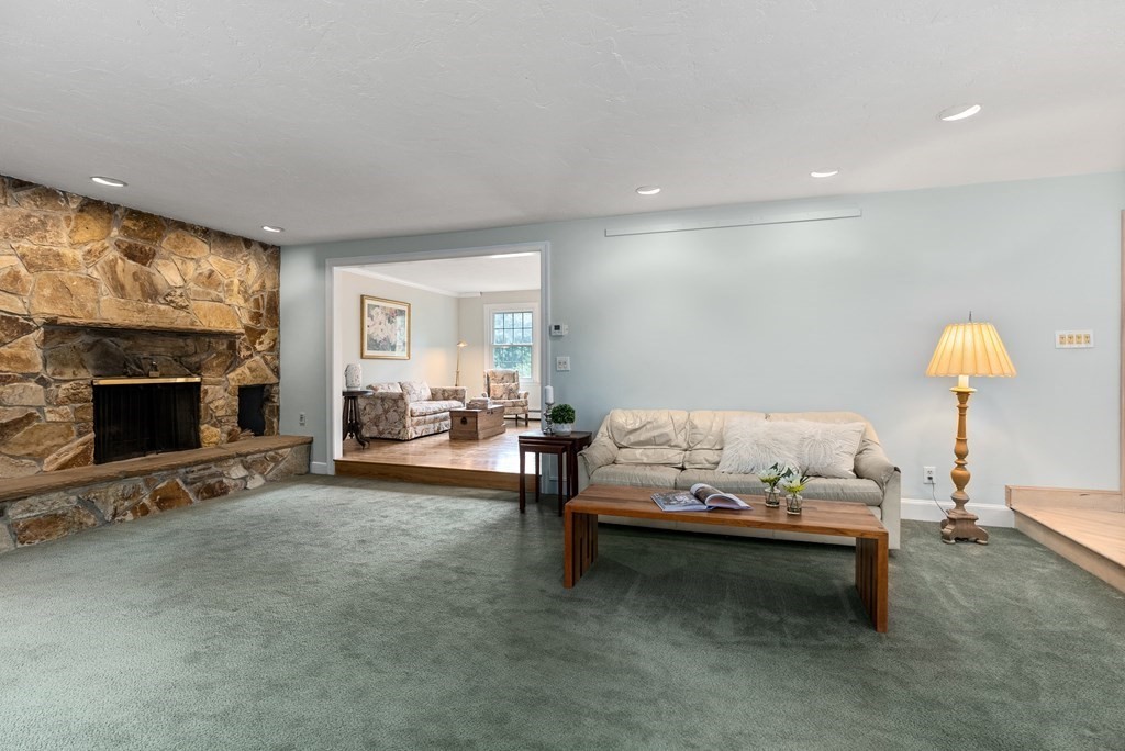 4 Standish Drive Canton, MA 02021 - Photo 13 of 32 a living room with furniture and a fireplace