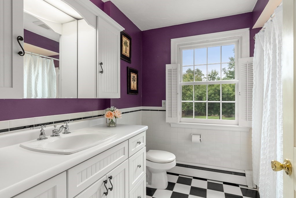 4 Standish Drive Canton, MA 02021 - Photo 23 of 32 a bathroom with a granite countertop sink and a mirror