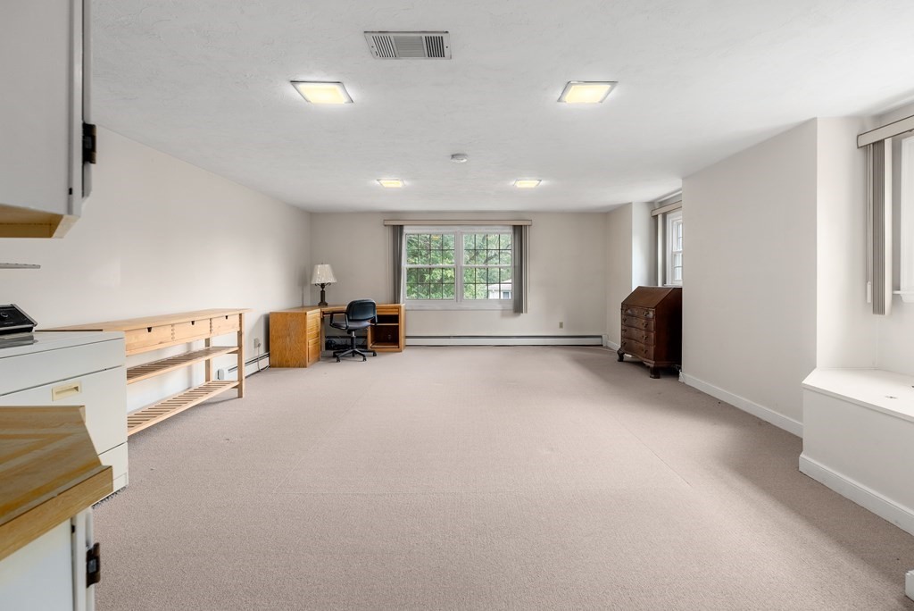 4 Standish Drive Canton, MA 02021 - Photo 26 of 32 a view of a livingroom with furniture and windows