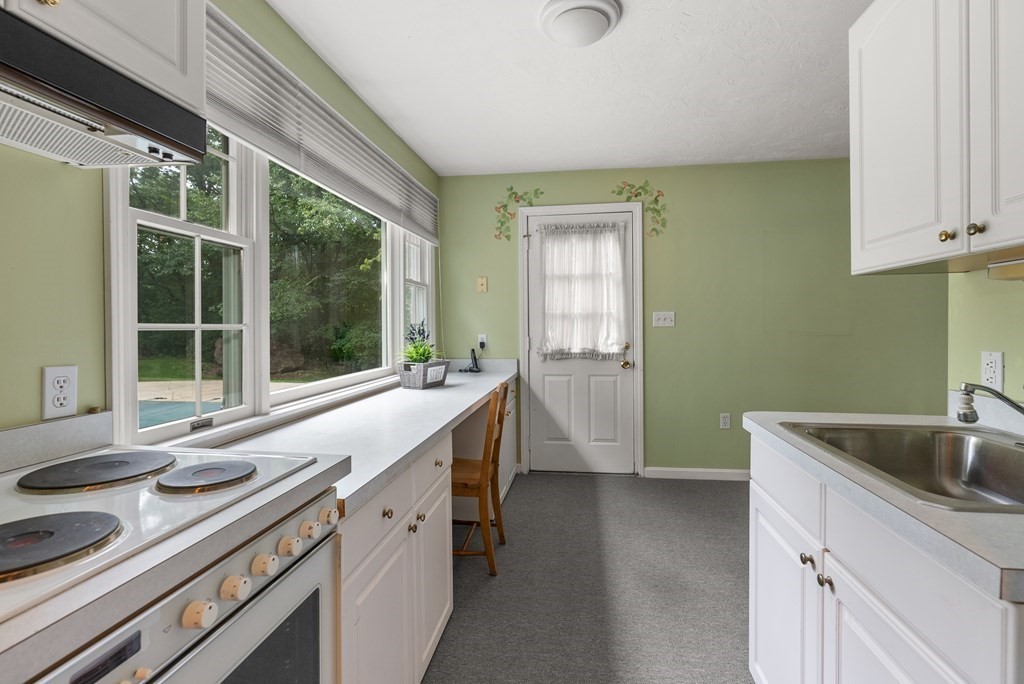4 Standish Drive Canton, MA 02021 - Photo 29 of 32 a kitchen with a sink and large window