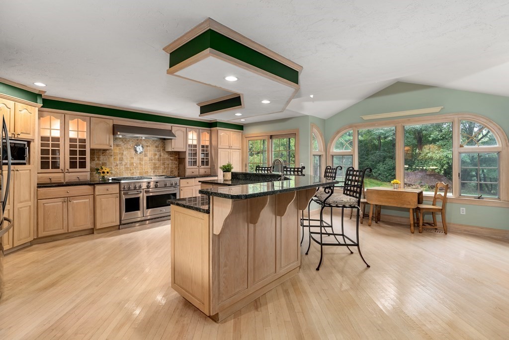 4 Standish Drive Canton, MA 02021 - Photo 3 of 32 a kitchen with counter top space and appliances