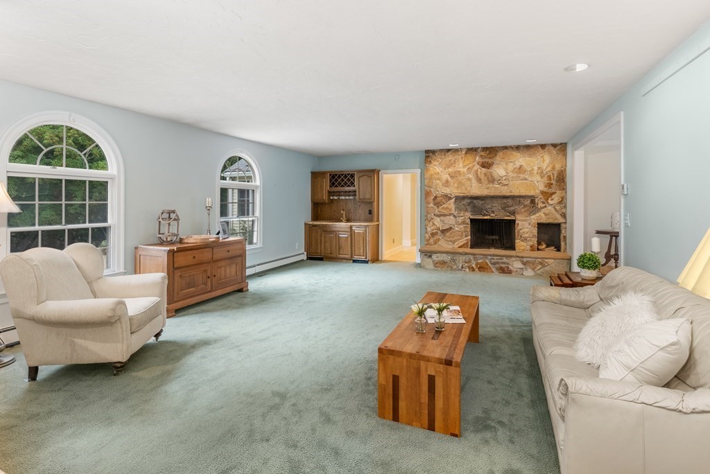 4 Standish Drive Canton, MA 02021 - Photo 10 of 32 a living room with furniture and a fireplace