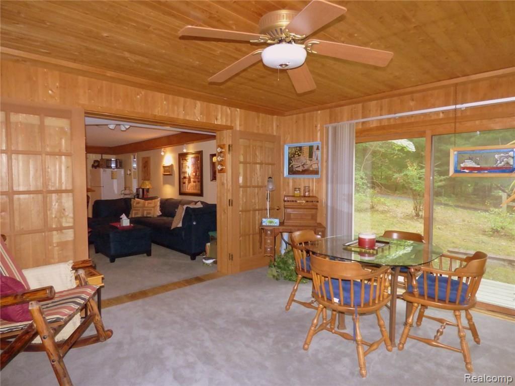 11070 Mcgregor Road Pinckney, MI 48169 - Photo 20 of 30 18 4 SEASONS ROOM OTHER DIRECTION.JPG