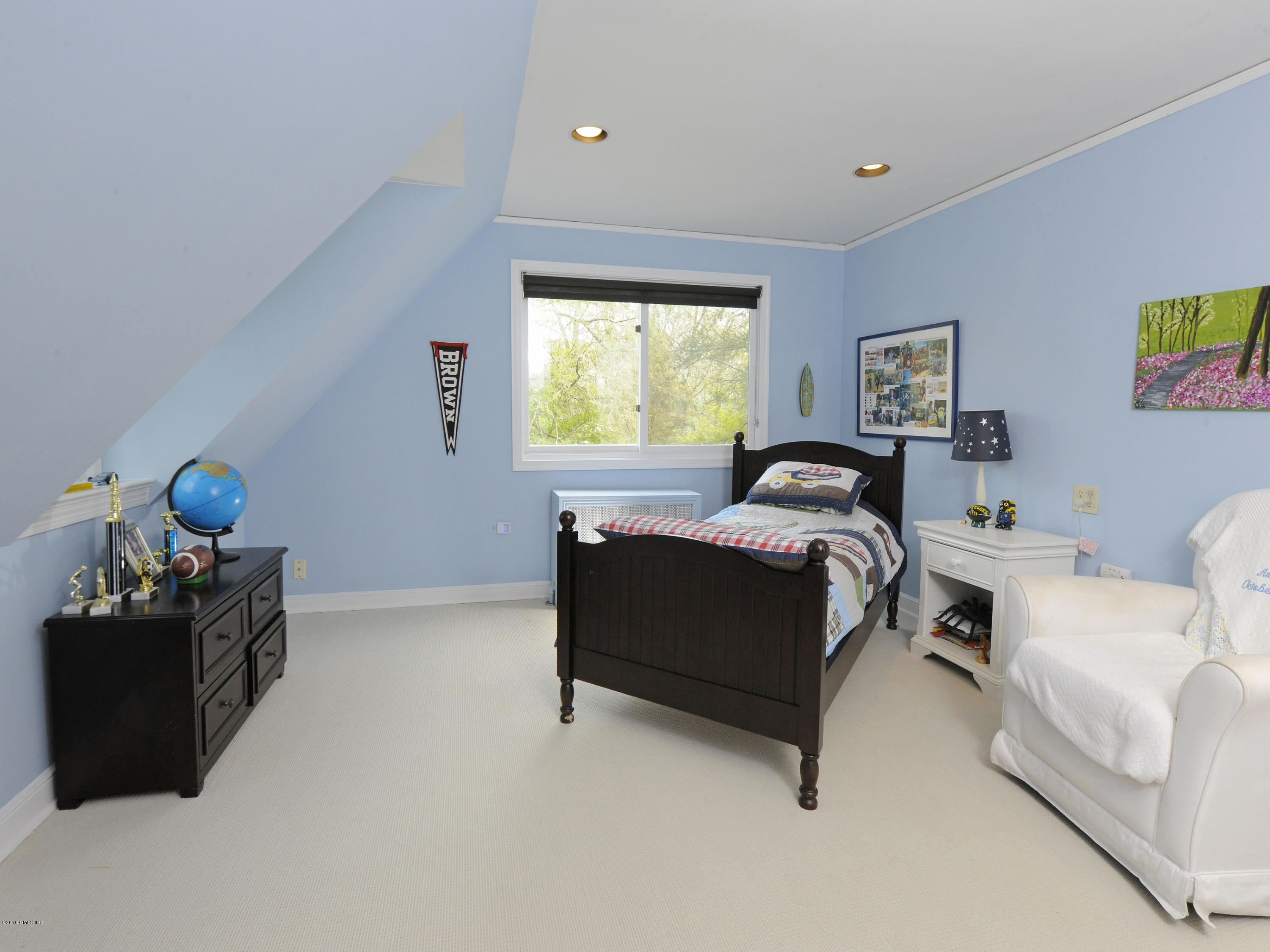 12 Wesskum Wood Road Riverside, CT 06878 - Photo 23 of 41 a bedroom with furniture and a window