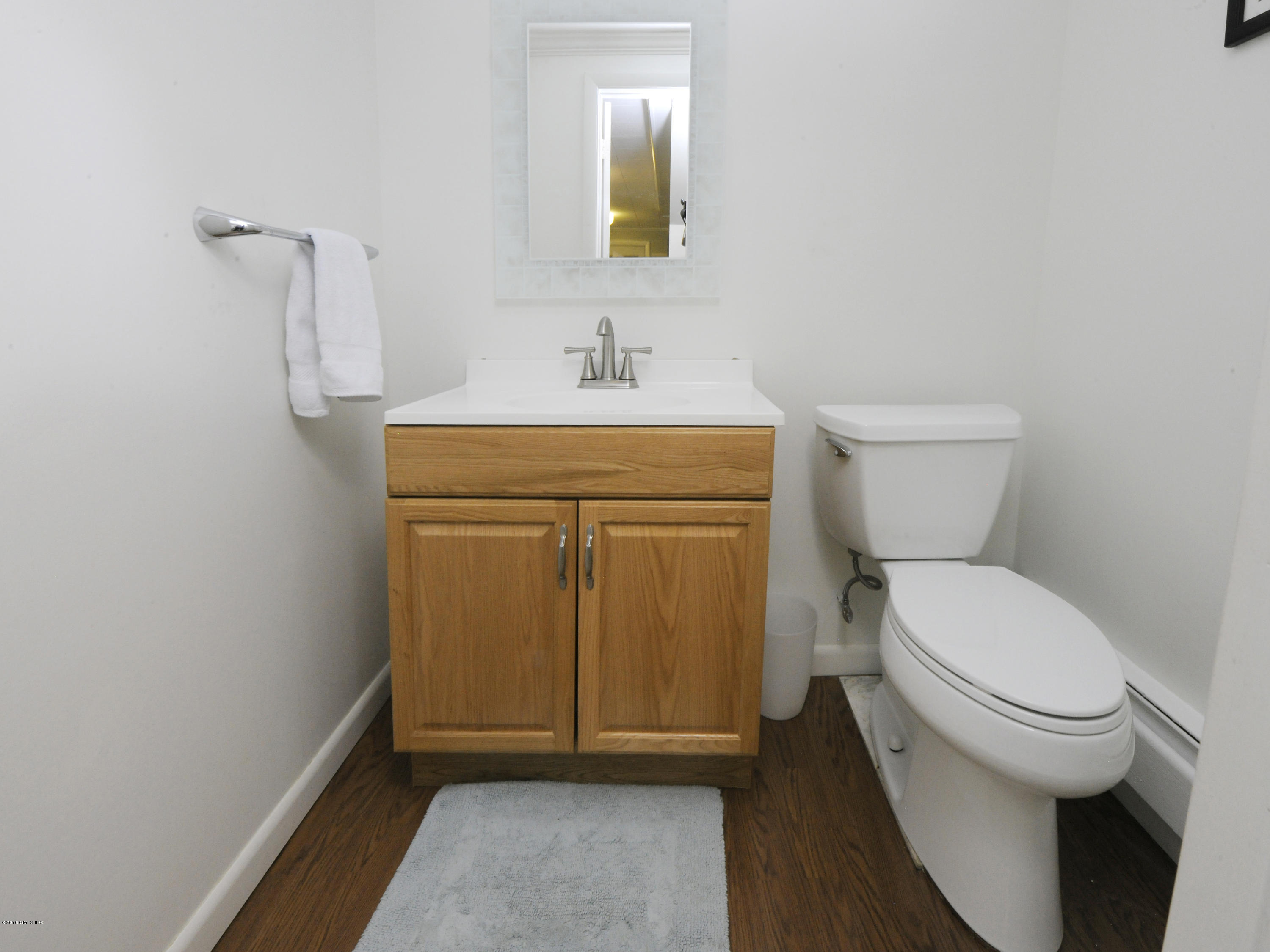 12 Wesskum Wood Road Riverside, CT 06878 - Photo 29 of 41 a bathroom with a toilet and a sink