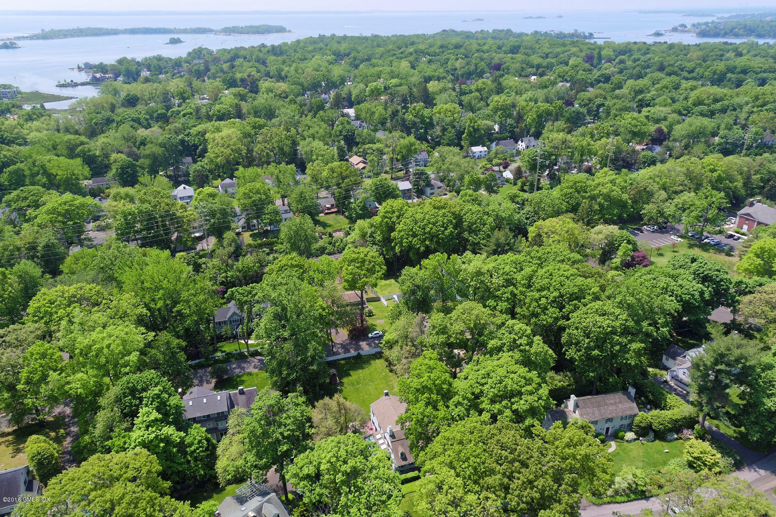12 Wesskum Wood Road Riverside, CT 06878 - Photo 37 of 41 an aerial view of residential house with outdoor space and trees all around