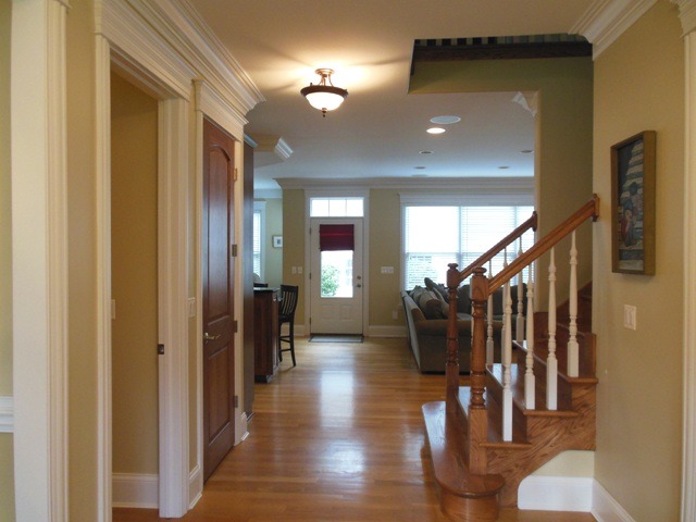 509 Phillippa Street Hinsdale, IL 60521 - Photo 9 of 20 a view of a hallway with wooden floor and stairs