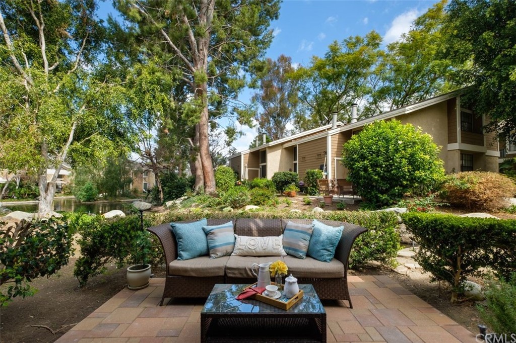 a outdoor living space with furniture and garden view
