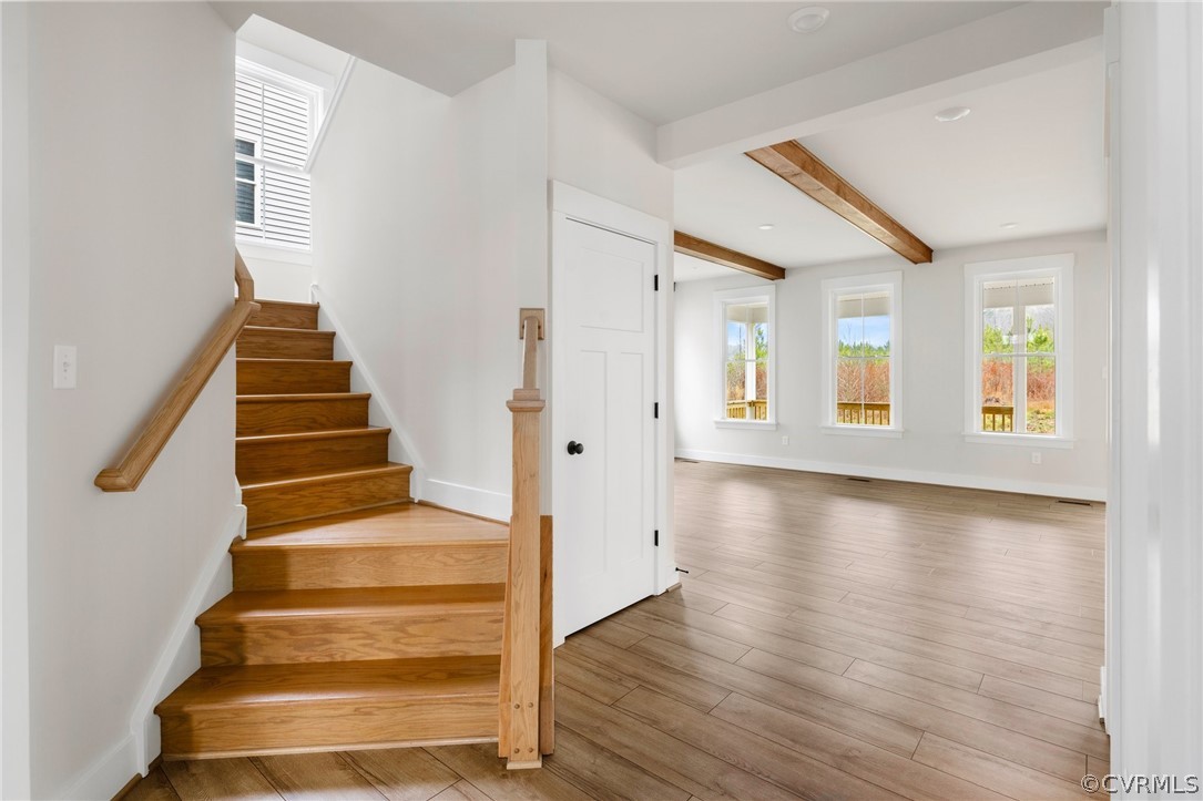 15142 Heaton Drive Midlothian, VA 23112 - Photo 2 of 41 a view of an entryway with wooden floor and stairs
