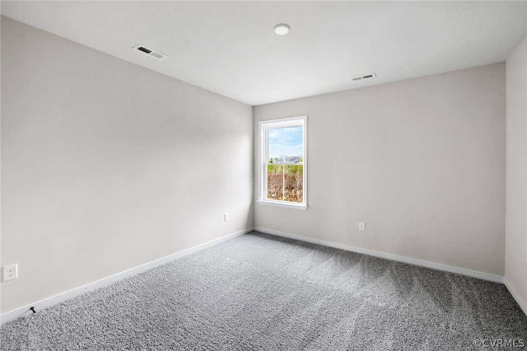 15142 Heaton Drive Midlothian, VA 23112 - Photo 22 of 41 an empty room with windows