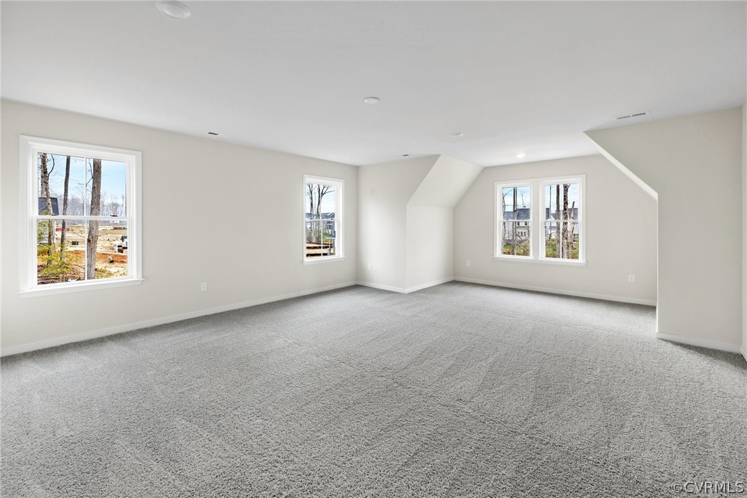 15142 Heaton Drive Midlothian, VA 23112 - Photo 29 of 41 a view of a big room with windows and chandelier fan