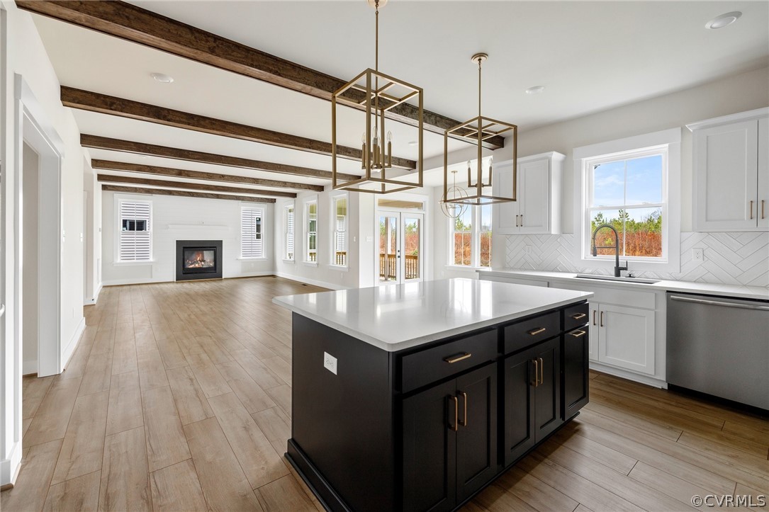 15142 Heaton Drive Midlothian, VA 23112 - Photo 5 of 41 a kitchen with stainless steel appliances granite countertop a stove and a wooden floors