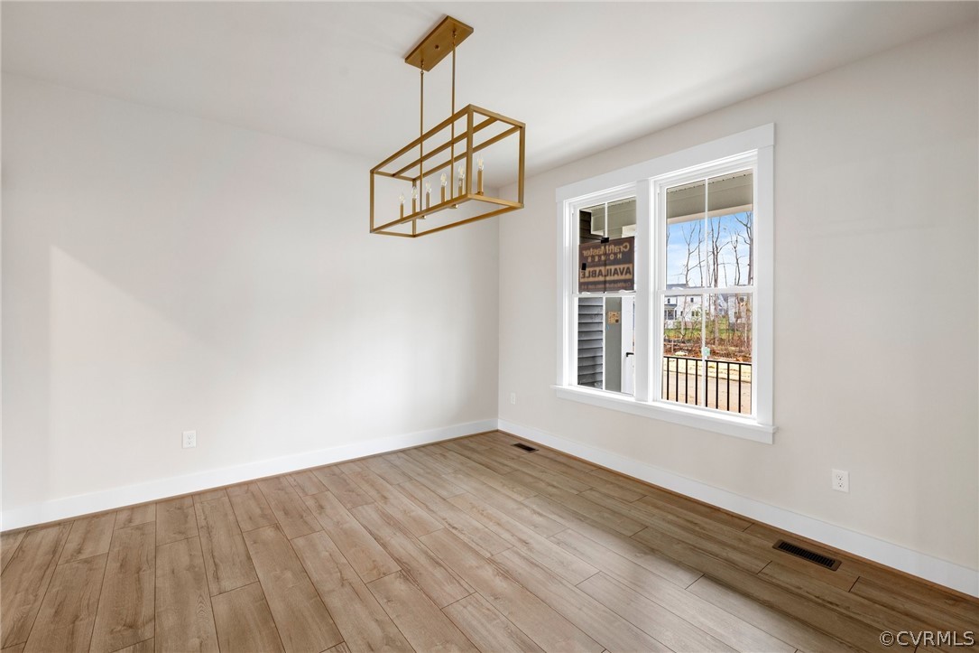 15142 Heaton Drive Midlothian, VA 23112 - Photo 7 of 41 an empty room with windows