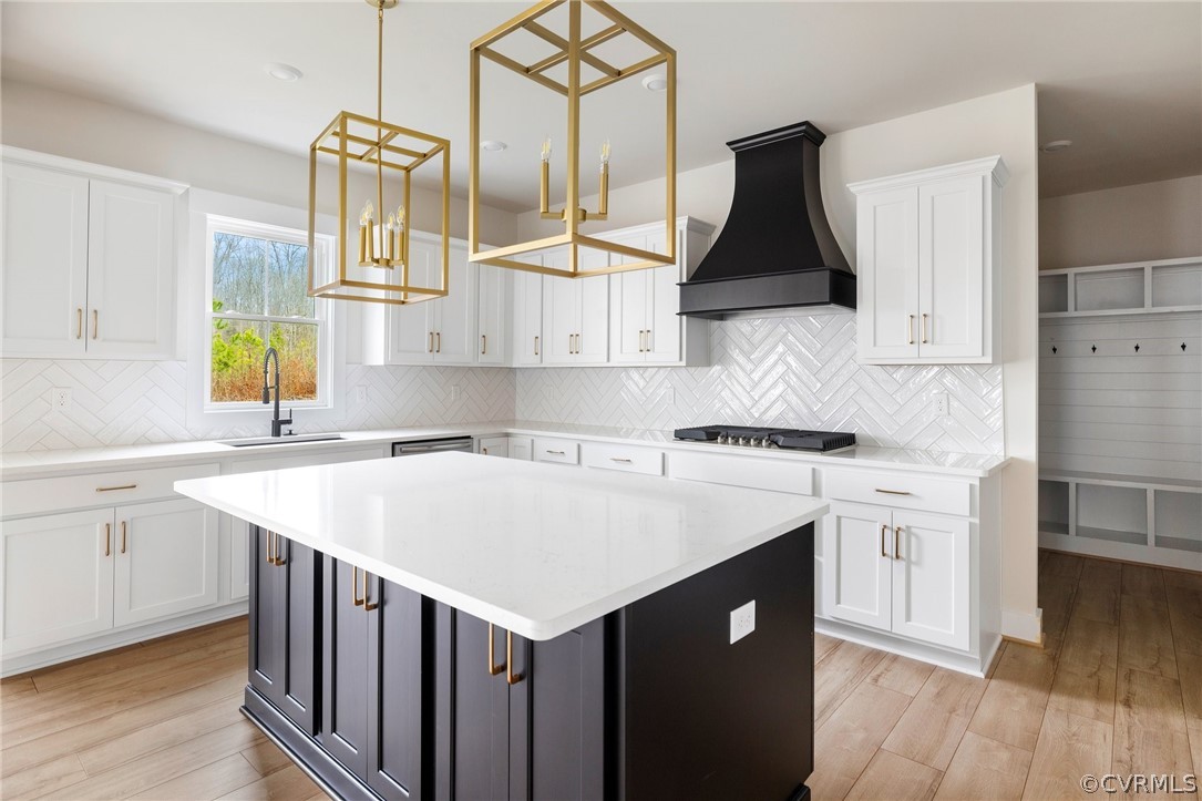 15142 Heaton Drive Midlothian, VA 23112 - Photo 10 of 41 a kitchen with a sink a stove a refrigerator and white cabinets