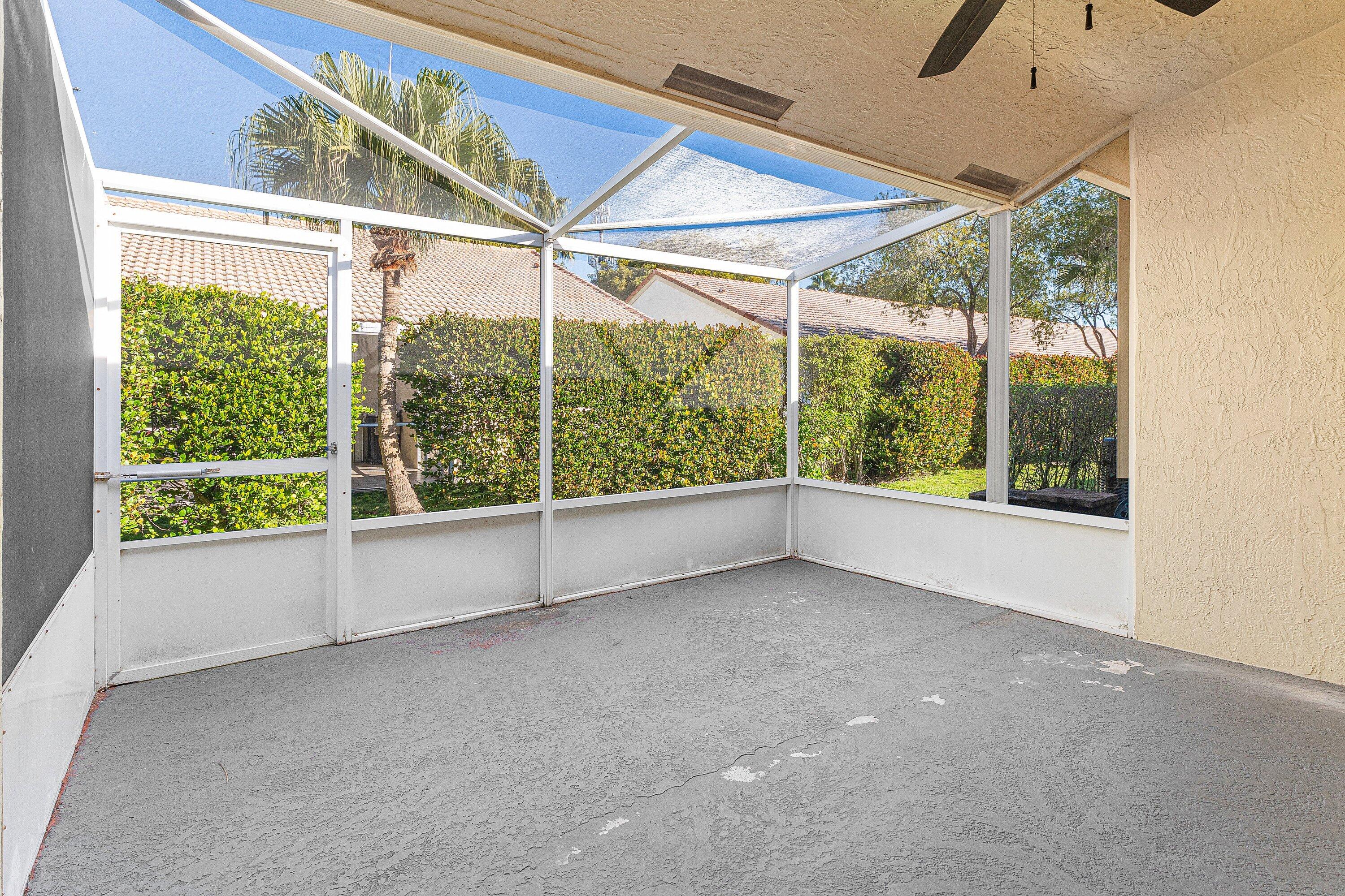 6081 Heliconia Road Delray Beach, FL 33484 - Photo 27 of 39 a view of a room with a large window