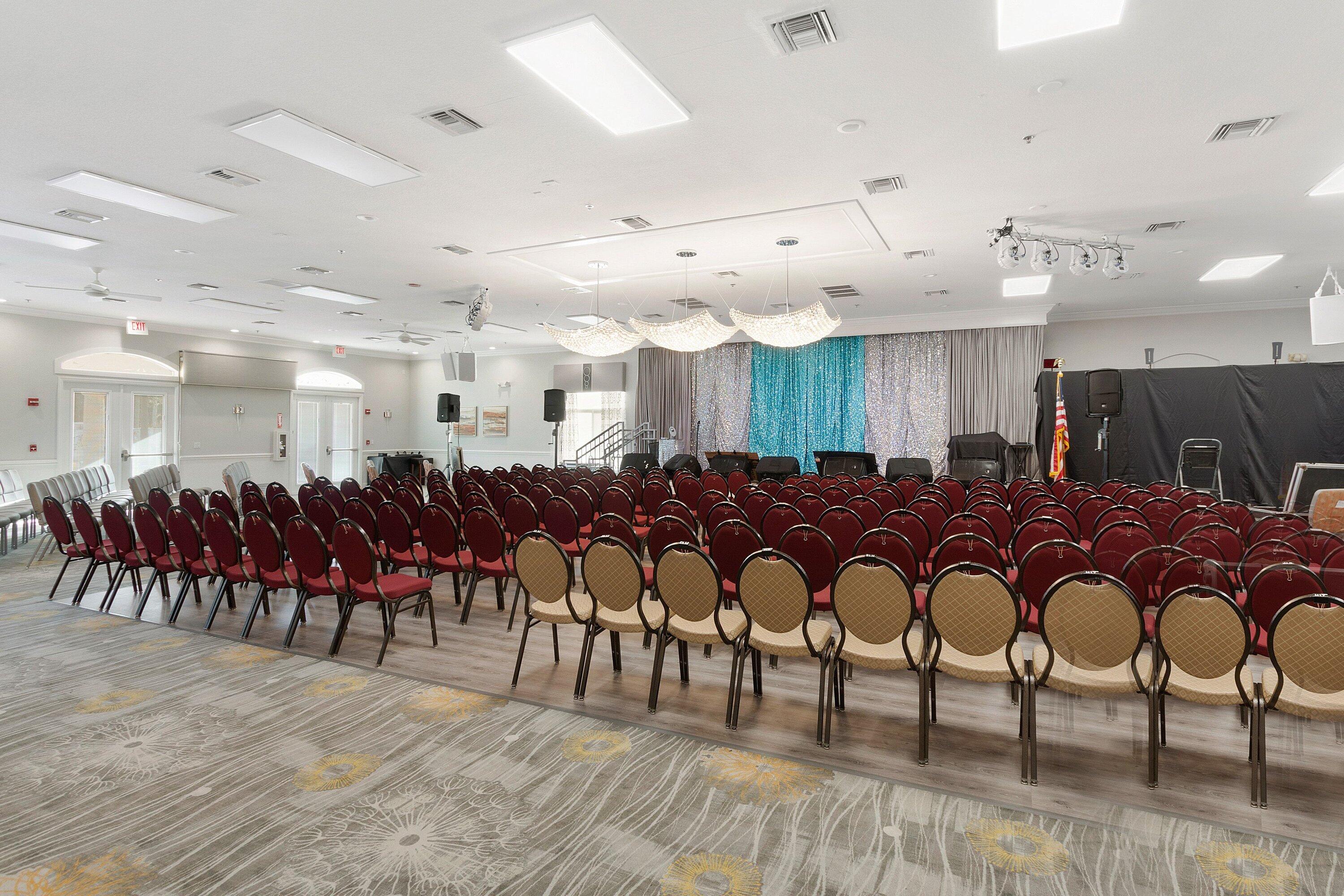 6081 Heliconia Road Delray Beach, FL 33484 - Photo 32 of 39 a large room with lots of wooden furniture