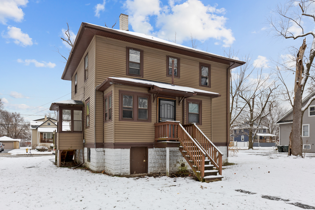 16746 Lincoln Street Hazel Crest, IL 60429 - Photo 18 of 20 a front view of a house with a snow