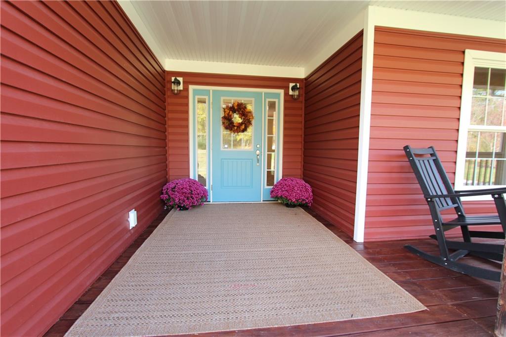 169 Wilpen Road Ligonier, PA 15658 - Photo 33 of 49 a view of a house with backyard and wooden stairs