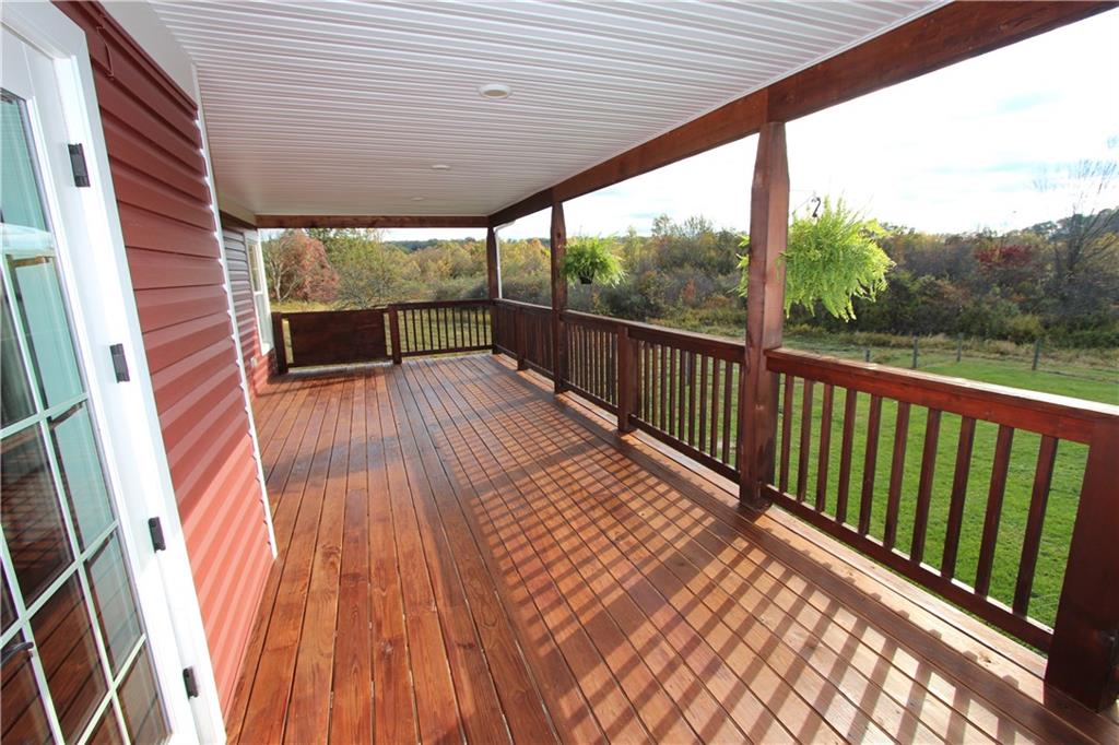 169 Wilpen Road Ligonier, PA 15658 - Photo 34 of 49 a view of balcony with wooden floor