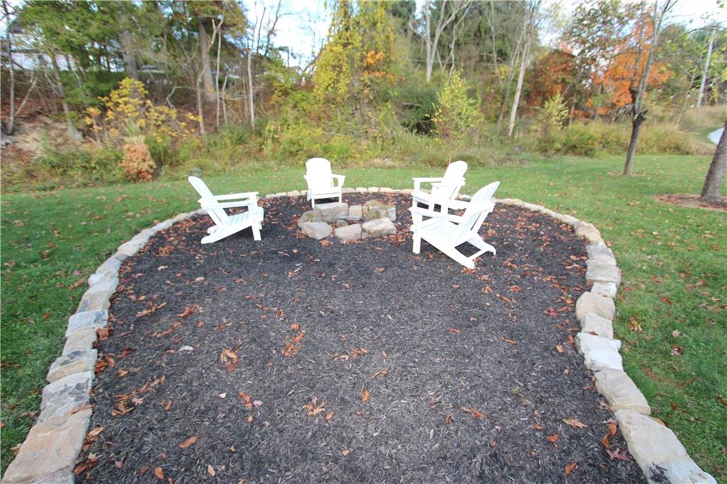 169 Wilpen Road Ligonier, PA 15658 - Photo 43 of 49 a view of a table and chairs in the garden