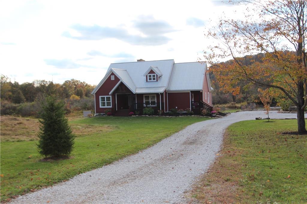 169 Wilpen Road Ligonier, PA 15658 - Photo 47 of 49 a view of a house with a yard