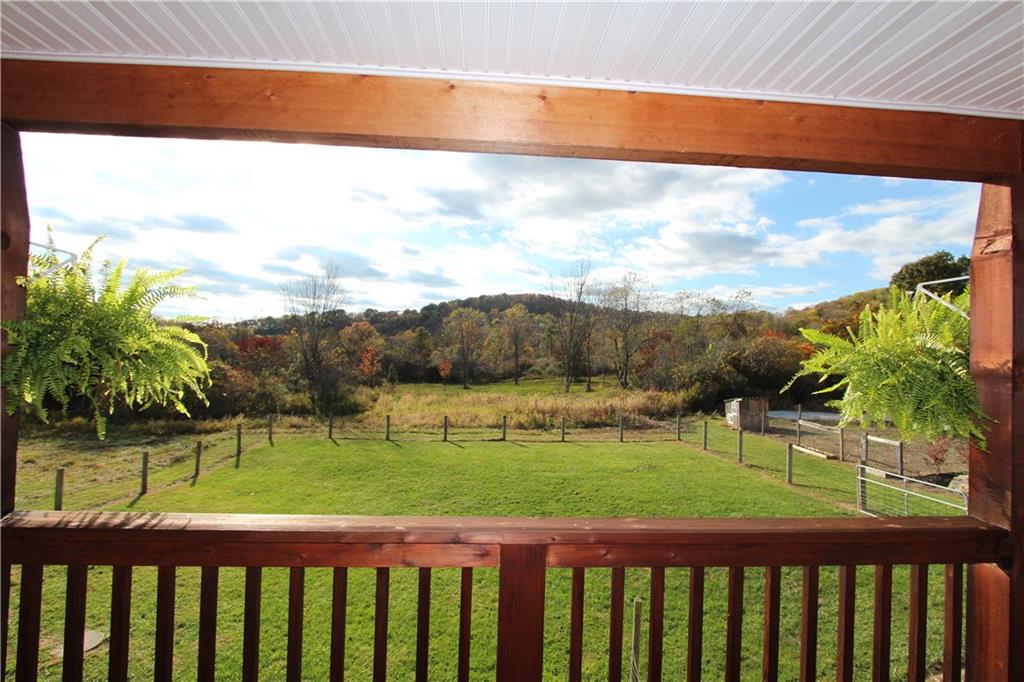 169 Wilpen Road Ligonier, PA 15658 - Photo 5 of 49 a balcony with a garden