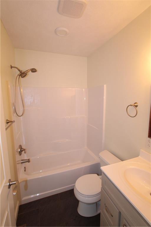 169 Wilpen Road Ligonier, PA 15658 - Photo 9 of 49 a bathroom with a granite countertop bathtub shower sink vanity and toilet