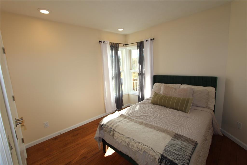 169 Wilpen Road Ligonier, PA 15658 - Photo 10 of 49 a bedroom with a bed and a window