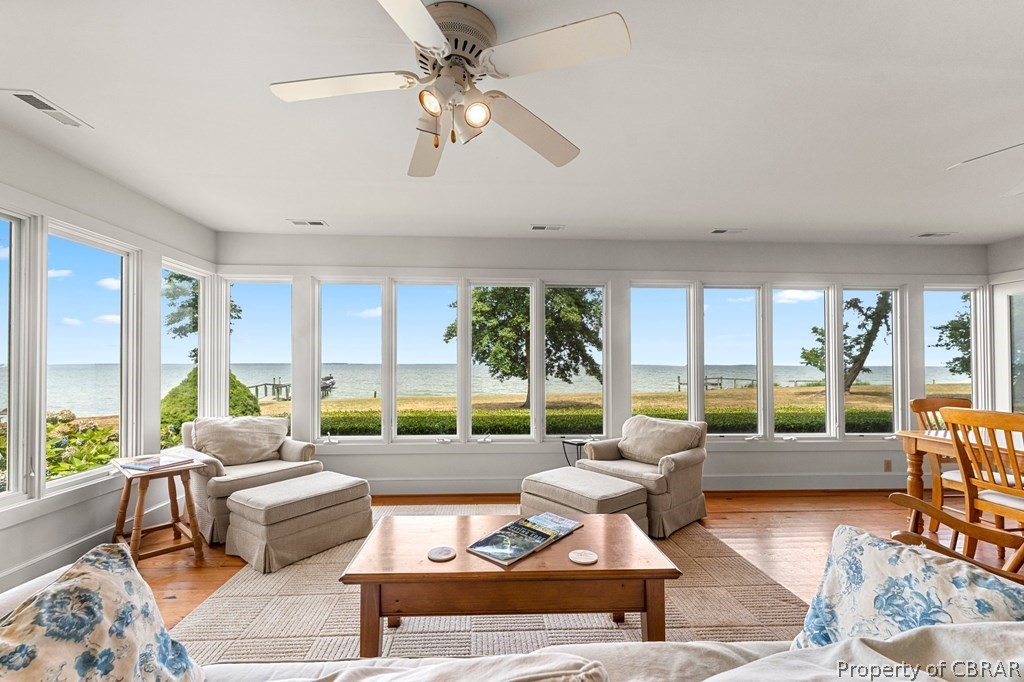 1 Cabin Road Lottsburg, VA 22511 - Photo 17 of 50 Sunroom / solarium featuring a water view and ceiling fan