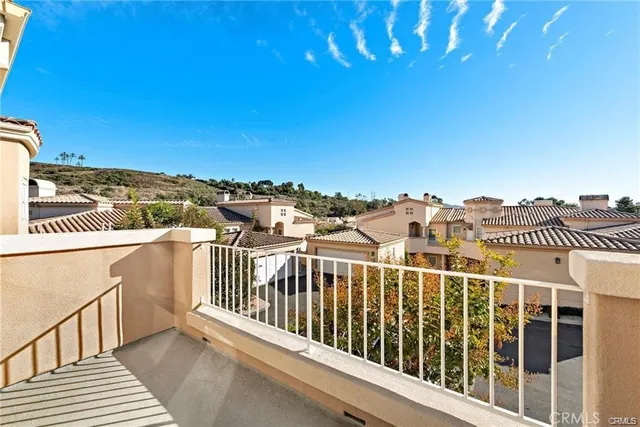 a view of a balcony with city view