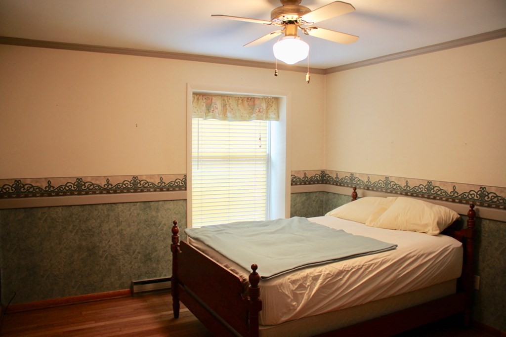 657 Forest Lane Franklin, PA 16323 - Photo 15 of 15 a bedroom with a bed and a window