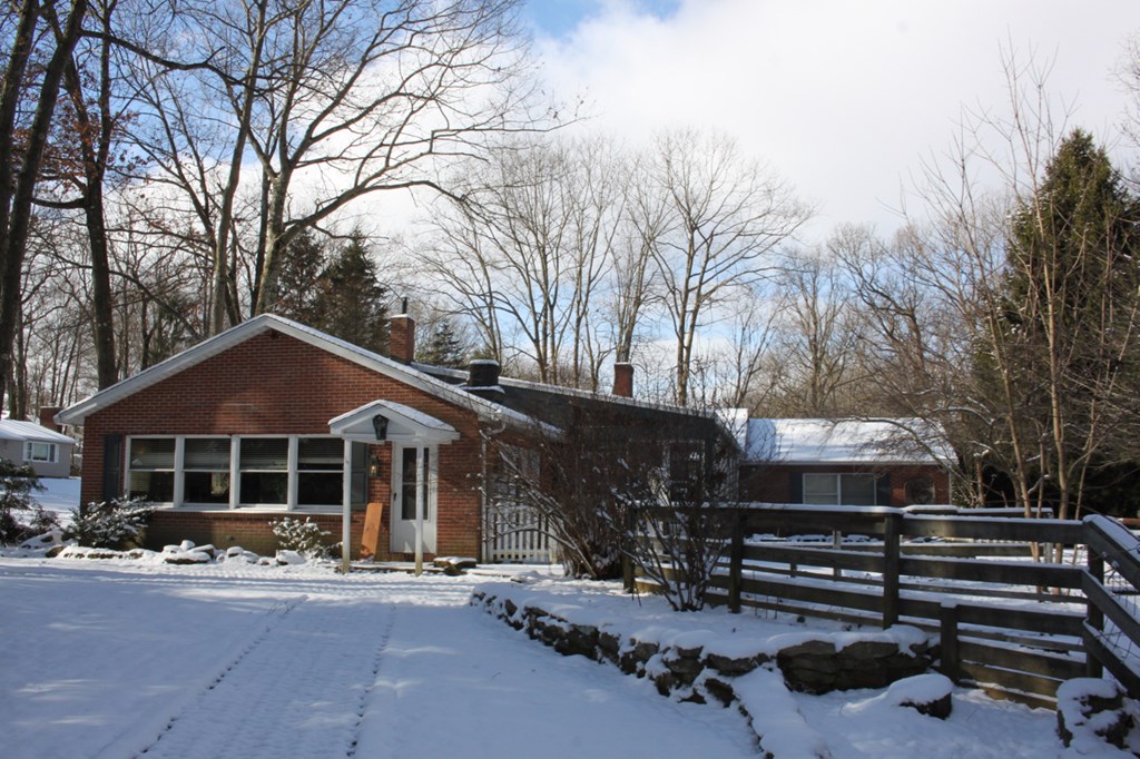 657 Forest Lane Franklin, PA 16323 - Photo 3 of 15 a front view of a house with a yard