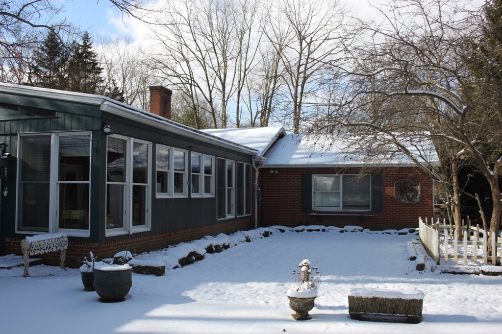 657 Forest Lane Franklin, PA 16323 - Photo 4 of 15 a front view of a house with sitting area