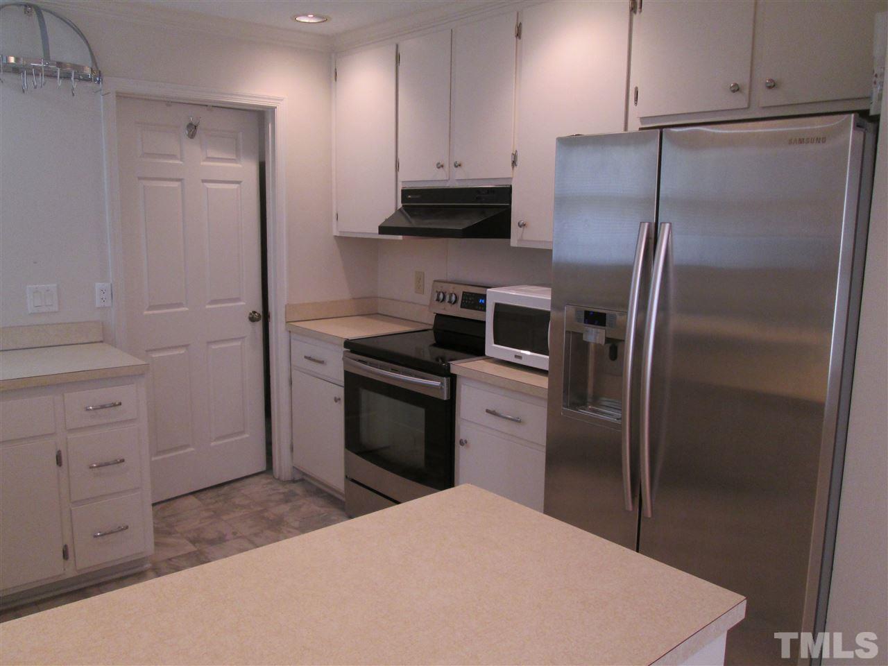3701 Pine Knoll Drive Raleigh, NC 27604 - Photo 6 of 20 Door in back leads to laundry room.