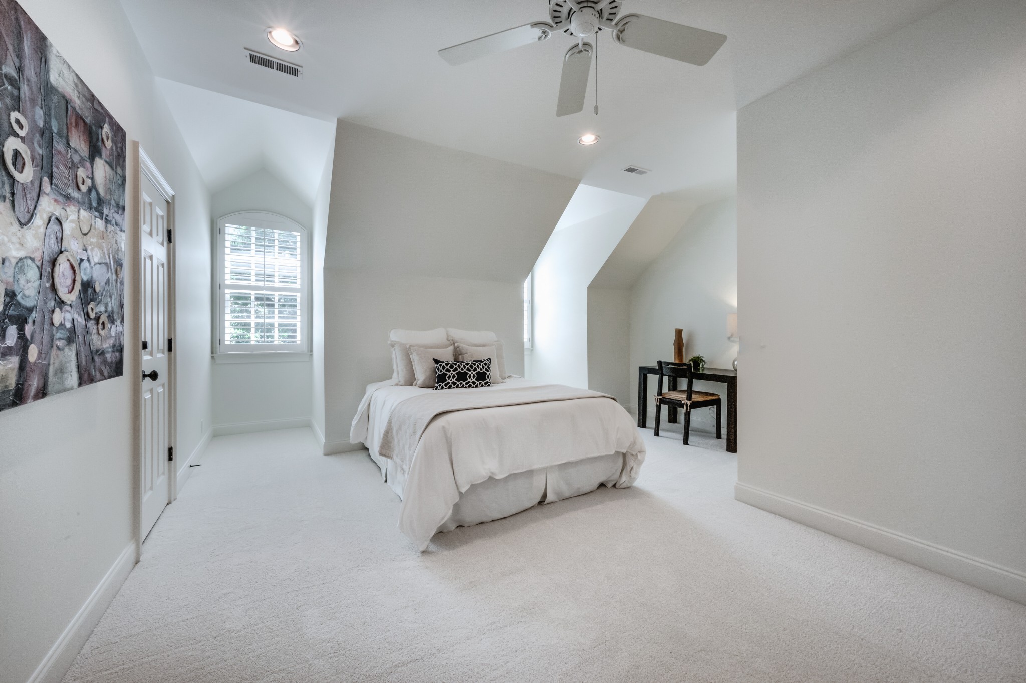 114 Cheek Road Nashville, TN 37205 - Photo 32 of 50 a spacious bedroom with a bed and a chandelier