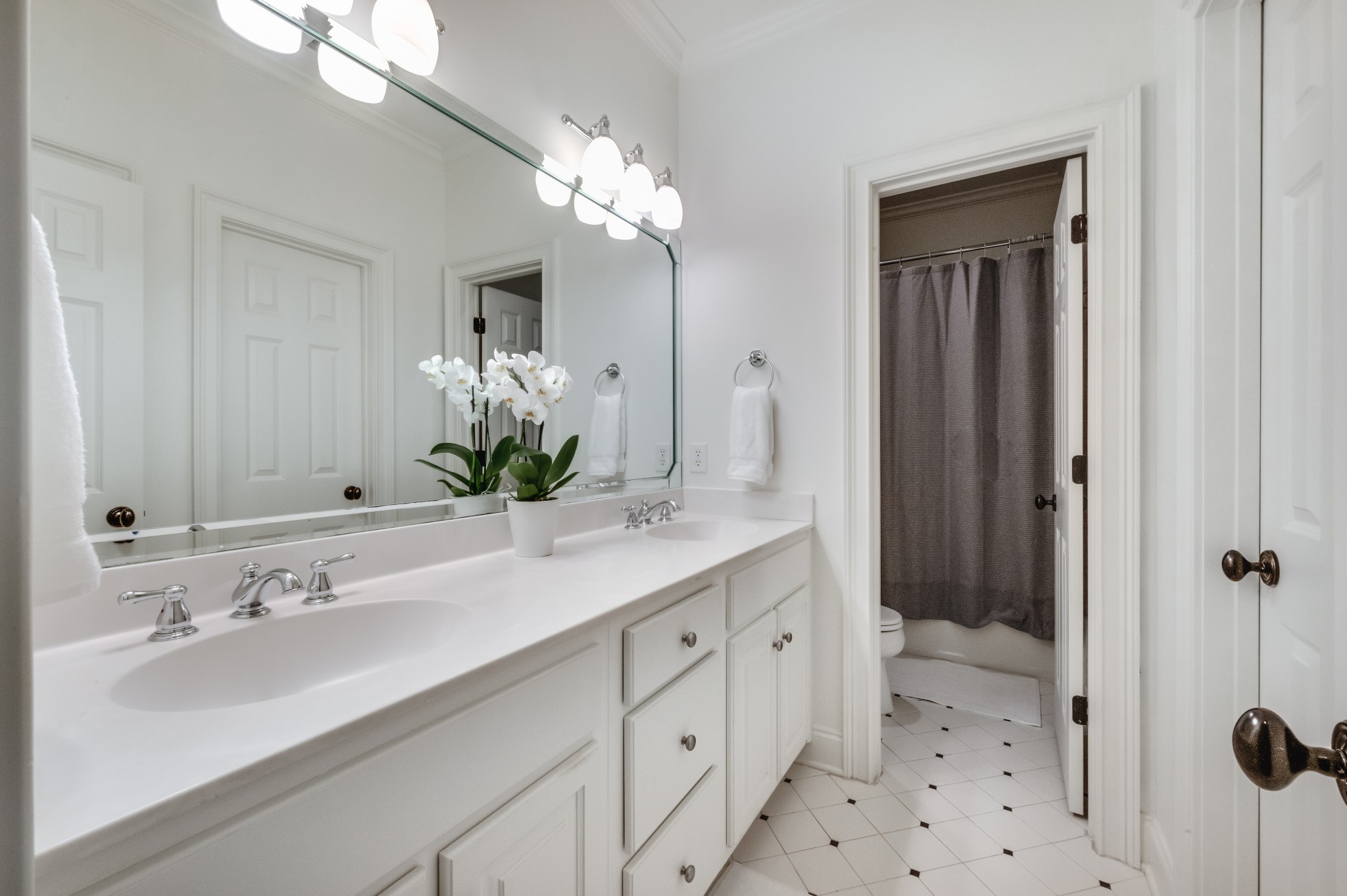 114 Cheek Road Nashville, TN 37205 - Photo 33 of 50 a bathroom with a double vanity sink mirror and shower