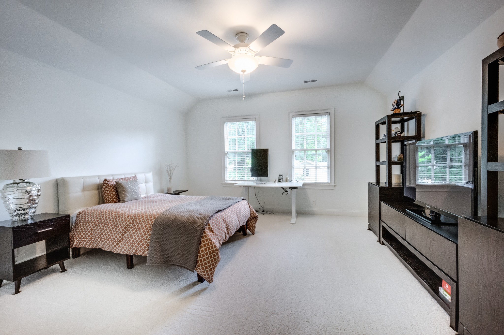 114 Cheek Road Nashville, TN 37205 - Photo 34 of 50 a spacious bedroom with a bed and a flat screen tv