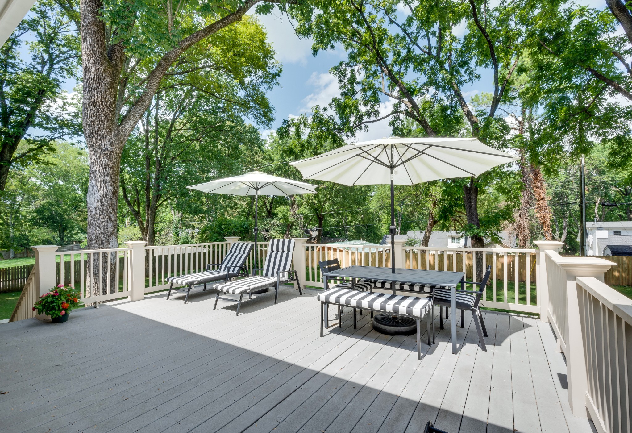 114 Cheek Road Nashville, TN 37205 - Photo 41 of 50 a view of balcony with outdoor seating and wooden floor
