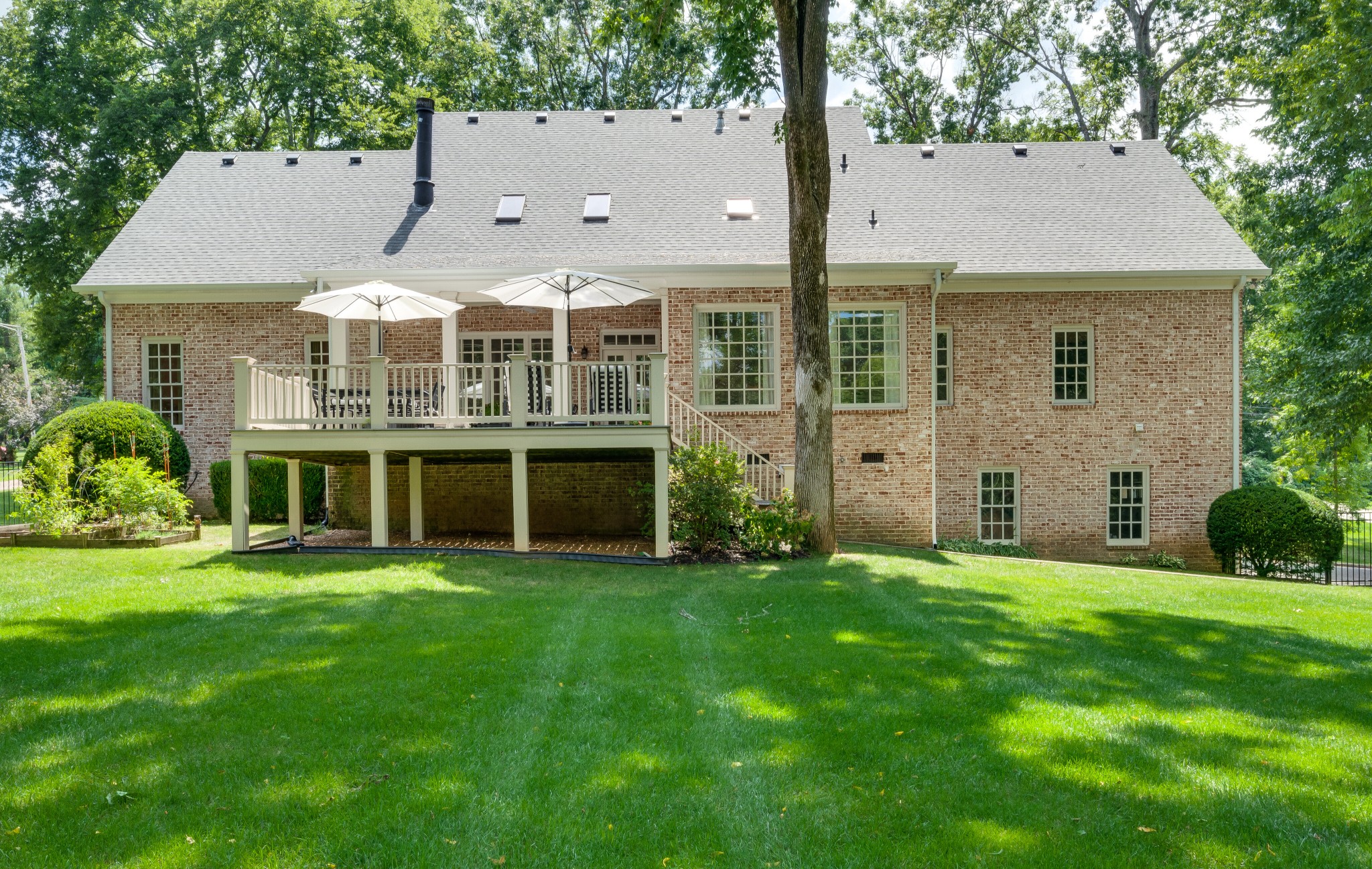 114 Cheek Road Nashville, TN 37205 - Photo 45 of 50 front view of a house with a yard
