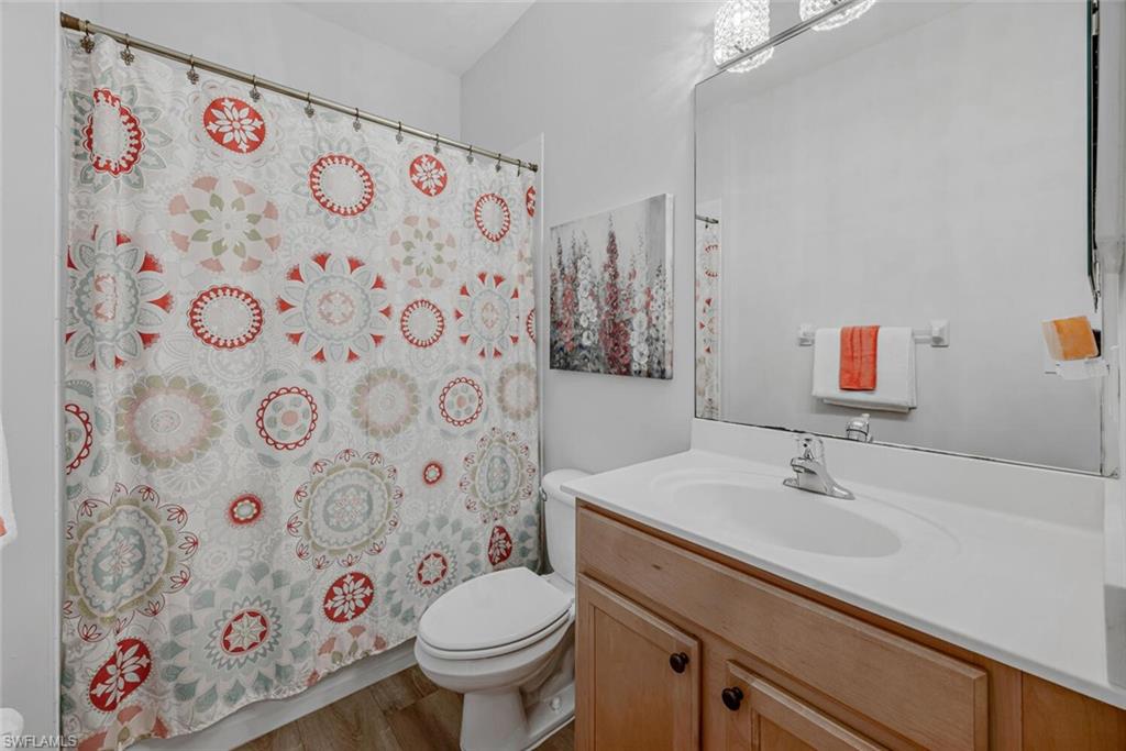 3732 Costa Maya Way Estero, FL 33928 - Photo 14 of 19 a bathroom with a sink and a mirror