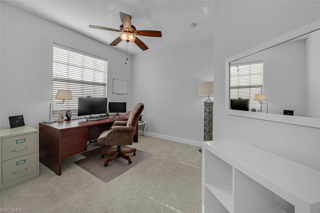 3732 Costa Maya Way Estero, FL 33928 - Photo 15 of 19 a view of a workspace with furniture and a window