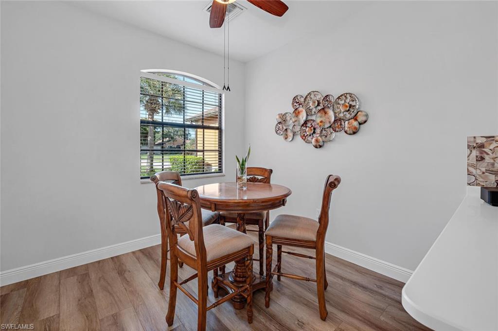 3732 Costa Maya Way Estero, FL 33928 - Photo 5 of 19 a dining room with furniture and window