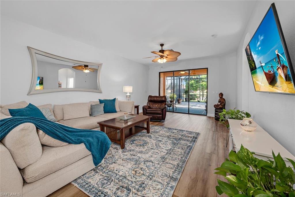 3732 Costa Maya Way Estero, FL 33928 - Photo 6 of 19 a living room with furniture and a potted plant